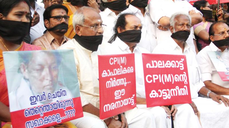 BJP leaders stage a dharna against the CPI (M) attacks at Central Junction in Kottayam on Monday. (Photo: DC)