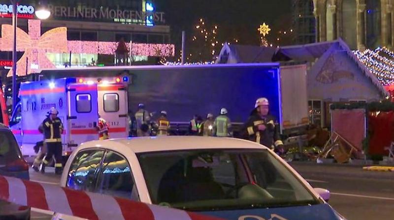 Long-held fears of a major attack on German soil became reality on Monday when an extremist rammed a truck into a crowded Christmas market, killing 12 people and injuring dozens. (Photo: AP)