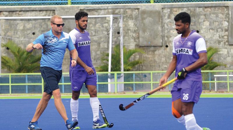 India hockey coach Sjoerd Marijne (left) has marked the 2018 Asian Games and World Cup as  key  tournaments.
