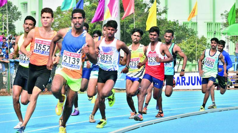 Athletes during a race at the 78th All-India Inter-University Athletic Championship at Acharya Nagarjuna University on Tuesday. (Photo: Tejo Roy Eleti)