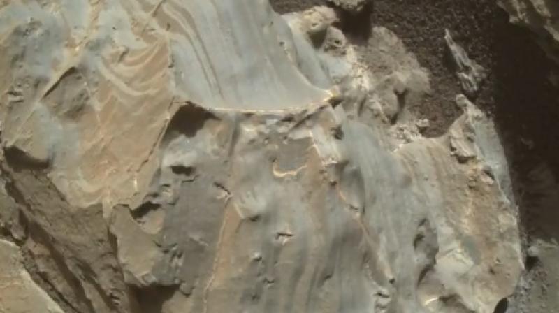 Meanwhile NASA has described the shapes in images as rock crystals which are being analysed (Photo: YouTube)