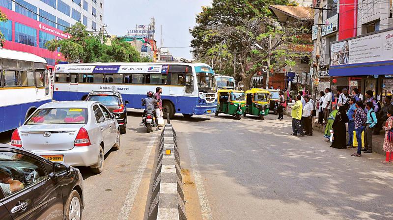 Bengaluru is unscientifically planned, say experts, with bus stops placed randomly and buses swerving dangerously  to get to them. (Photo: DC)