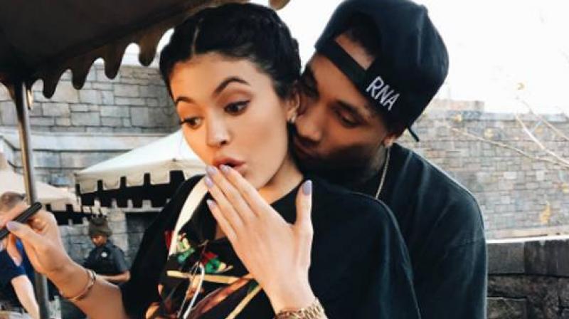 Kylie and Tyga are seen sharing a light moment here.