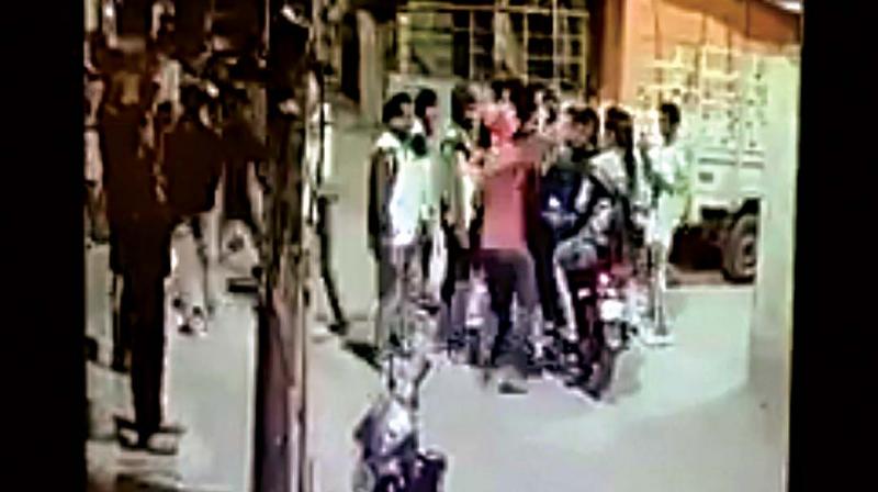 A senior police official said that the incident was captured on a CCTV camera, which showed 10-12 members of the gang drinking and dancing in the middle of the road.