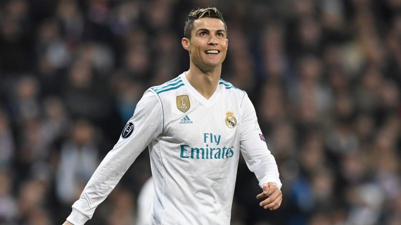 Cristiano Ronaldo followed Lionel Messi in hitting his 300th and 301st goals after just 286 matches in the Spanish top flight. Messi needed 334 to reach the same mark. (Photo: AFP)