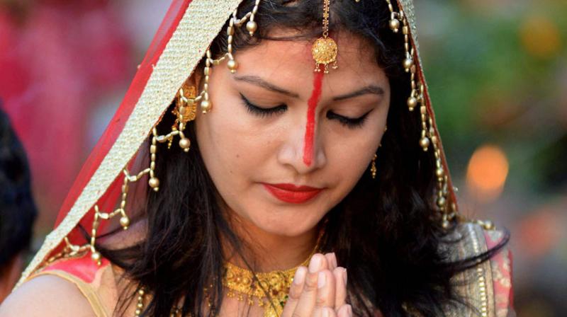 Devotees across India offer prayers to the rising sun on Chhath Puja