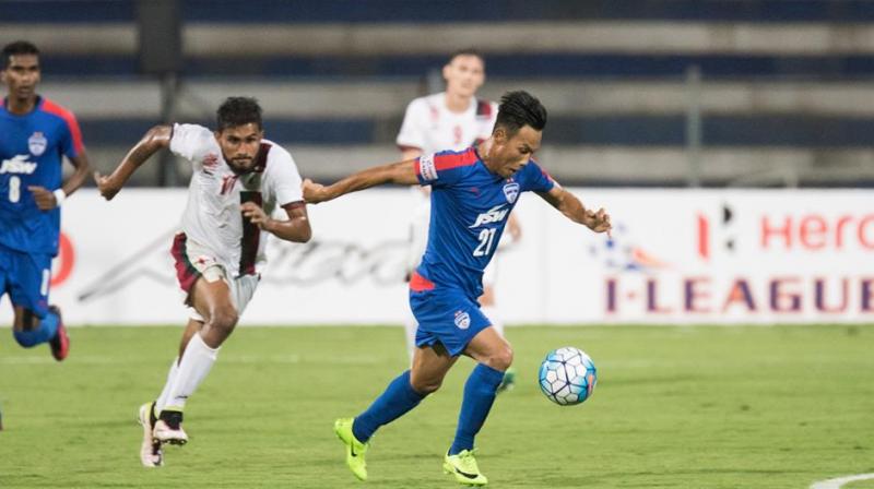 BFCs Eugenson Lyngdoh and Sony Norde of Mohun Bagan vie for the ball during their match on Saturday.(Photo: Bengaluru FC)