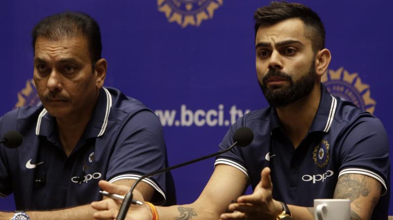 After slamming the Indian cricket teams critics following the teams arrival from South Africa, Team India coach Ravi Shastri has now hit out at those who questioned skipper Virat Kohlis attitude. (Photo: AP)
