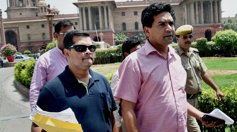 Sacked Delhi minister Kapil Mishra outside the the Mnistry of Finance at North Block in New Delhi. (Photo: PTI)
