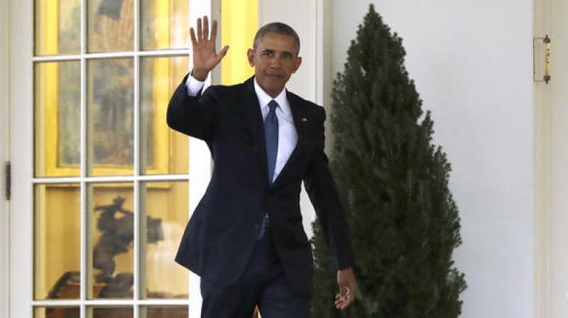 President Barack Obama waves as he leaves the Oval Office of the White House in Washington, before the start of presidential inaugural festivities for the incoming 45th President of the United States Donald Trump. (Photo: AP)