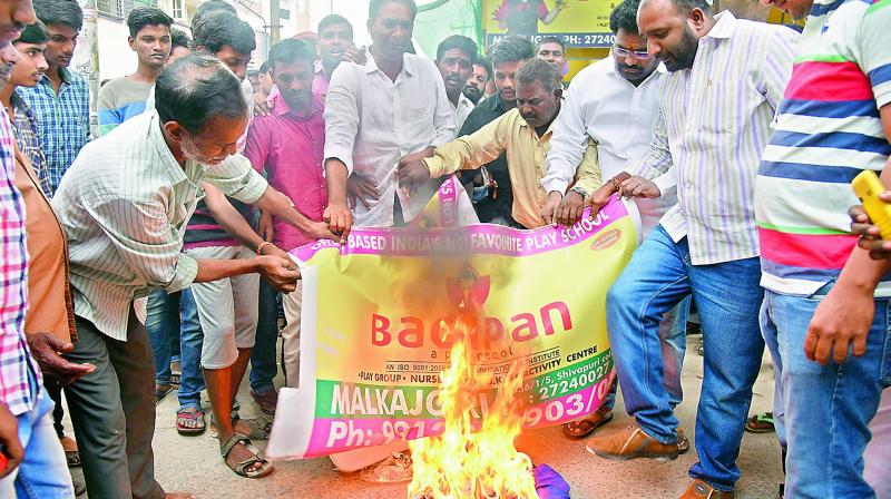 Residents and other parents protest in front of Bachpan School after Rachith drowned in an open sump at the school.  (Photo: DC)