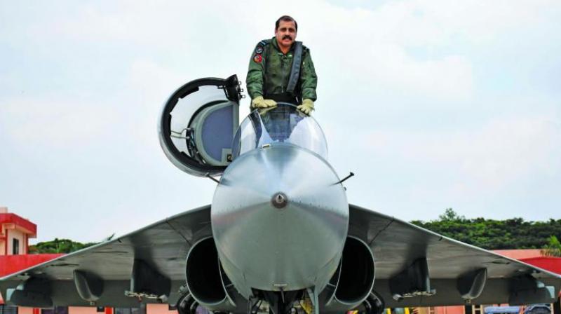 Air Marshal R.K.S. Bhadauria, Air Officer Commanding in Chief, Southern Command, with the aircraft.