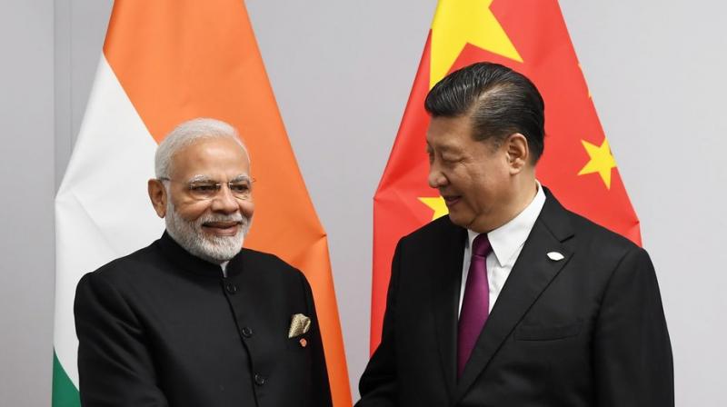 Modi told Xi that he was looking forward to host him for an informal summit next year. (Photo: @PMO/Twitter)