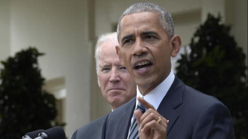 President Barack Obama, accompanied by Vice President Joe Biden (Photo: AP)