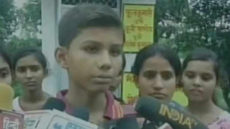 This young boy from Gonda village has gifted a toilet to his sister to avoid going out in the public. (Photo: ANI)