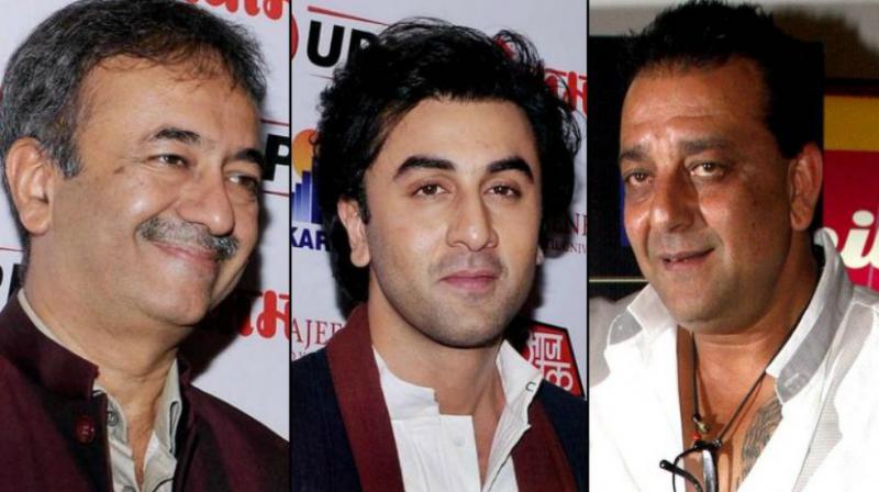 Rajkumar Hirani, Ranbir Kapoor, Sanjay Dutt at an event.