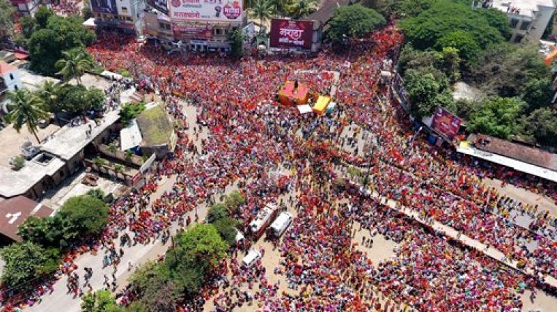 Maratha Community people gather to participate in the \Maratha Kranti Morcha\ in Kolhapur, Maharashtra on Saturday. (Photo: PTI)