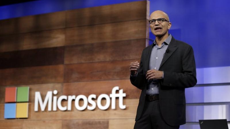 This file photo shows Microsoft CEO Satya Nadella speaking at the annual Microsoft shareholders meeting in Bellevue, Wash. Microsofts annual Build conference for software development kicks off on Monday, May 7, 2018, giving the company an opportunity to make announcements about its computing platforms or services. The three-day event features sessions on cloud computing, artificial intelligence, internet-connected devices and virtual reality. (AP Photo/Elaine Thompson, File)