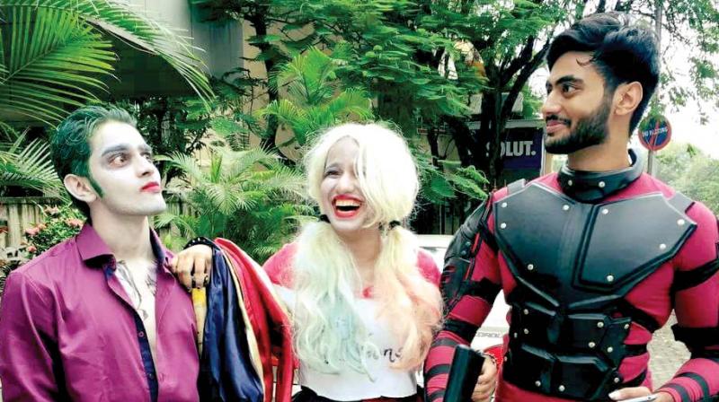 Raza Mohammed Khan, with Cosplay Karaoke hosts Kelly Gabrielle and Nabil Khan in their Suicide Squad -inspired cosplays