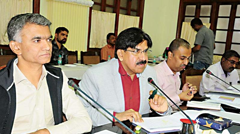 Rural Development and Panchayat Raj Minister, Krishna Byregowda (L) at a review meeting in Bengaluru on Wednesday 	DC
