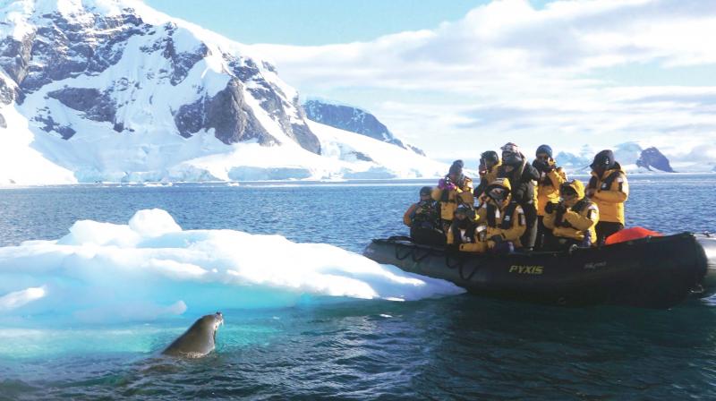 Tanisha with others in Antartica