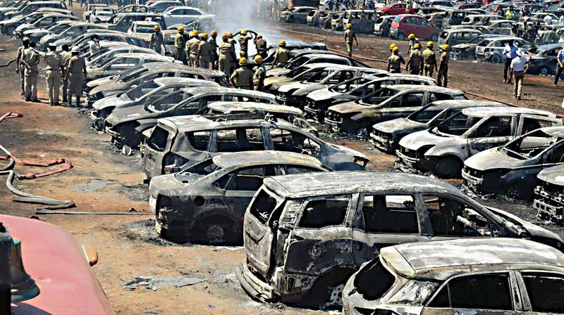 Over 300 cars gutted in a fire at a parking lot at Aero India 2019 in Bengaluru on Saturday. (Photo: Shashidhar B.)