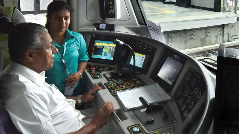 Chief Minister Pinarayi Vijayan at the drivers cabin during his metro ride in Kochi on Saturday. (Photo:  ARUN CHANDRABOSE)