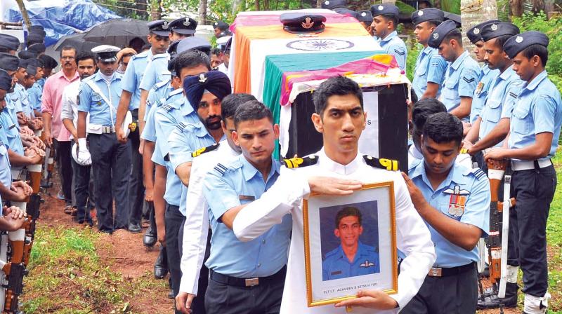 The body of flight lieutenant S. Achu Dev being taken for burial in Kozhikode on Saturday. 	(Photo: DC)