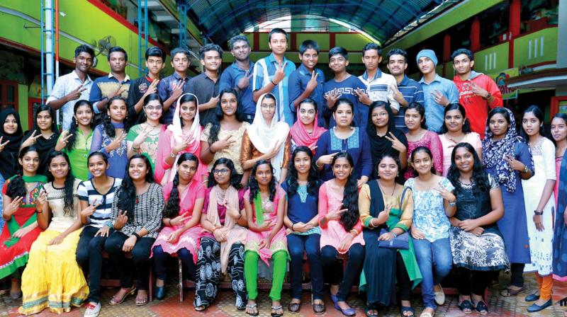 Students of Jyothis Central School, Kazhakuttam pose for a group photo.