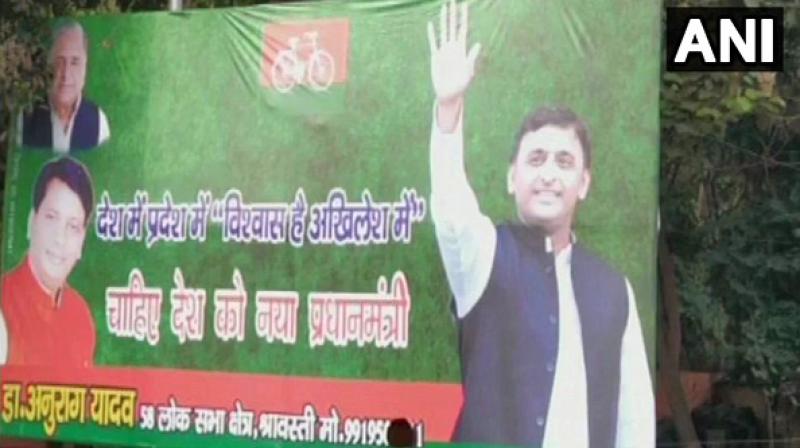 Posters have come up at many places in Lucknow, including one near Samajwadi Party (SP) state headquarters as well as in front of Akhileshs under-construction house. (Photo: ANI)