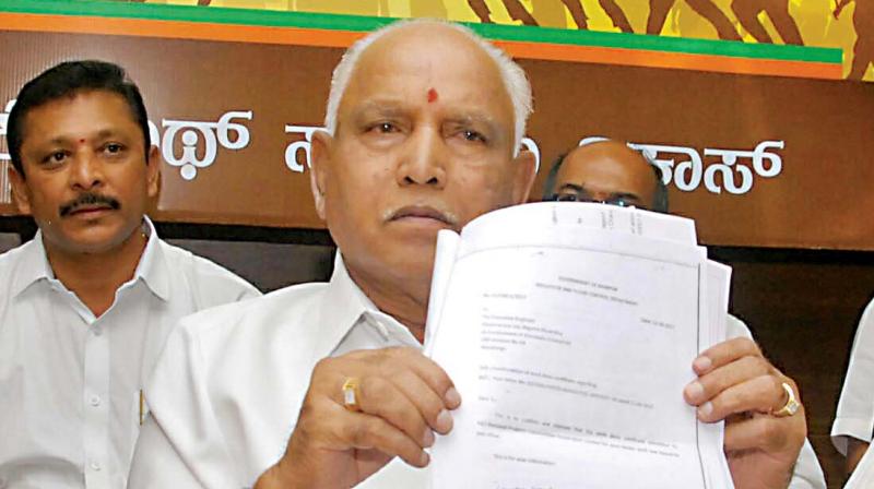 BJP state president and former CM B.S. Yeddyurappa addresses a press conference at the BJP office in Bengaluru on Thursday