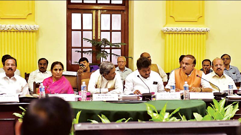 Chief Minister Siddaramaiah with Union Ministers, MPs and ministers at a meeting on the Supreme Courts Cauvery water verdict in Bengaluru on Thursday.