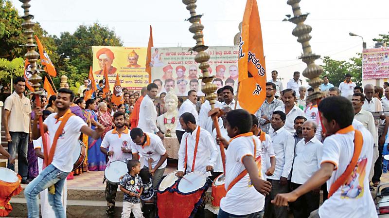 Lingayats celebrate after the state government decided to recommend religion status for them to the Centre, in this file photo