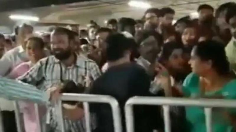 On its opening day, the store witnessed a stampede like situation as scores of people were waiting impatiently to take a sneak peek of the store. (Photo: Screengrab | ANI)