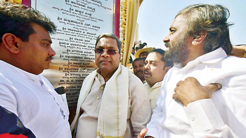 Chief Minister Siddaramaiah at the inauguration of various developmental works in Basavakalyan in Bidar district on Wednesday. Ministers M.B. Patil and Eshwar Khandre were also present.