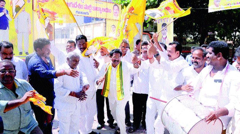 Vinukonda MLA and Guntur district TD president G.V.S Anjaneyulu dance for joy during the partys celebrations to mark its massive victory in the Kakinada Municipal Corporation elections, at state party office in Guntur on Friday. The TD returned to power in the corporation after 25 years in grand style winning 32 of the 45 wards it contested. Its alliance partner BJP won from three. The Opposition YSRC won from 10 wards. The Congress, which had won the corporation three times from 1995, did not win a single seat. What was worse, the former ruling party could not even get a cumulative 1,000 votes in the elections. (Photo: DC)