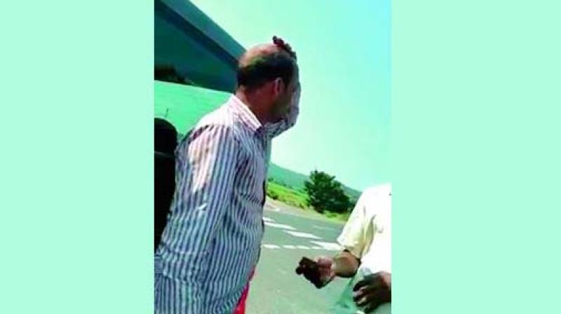 RTO driver demanding bribe from a truck driver