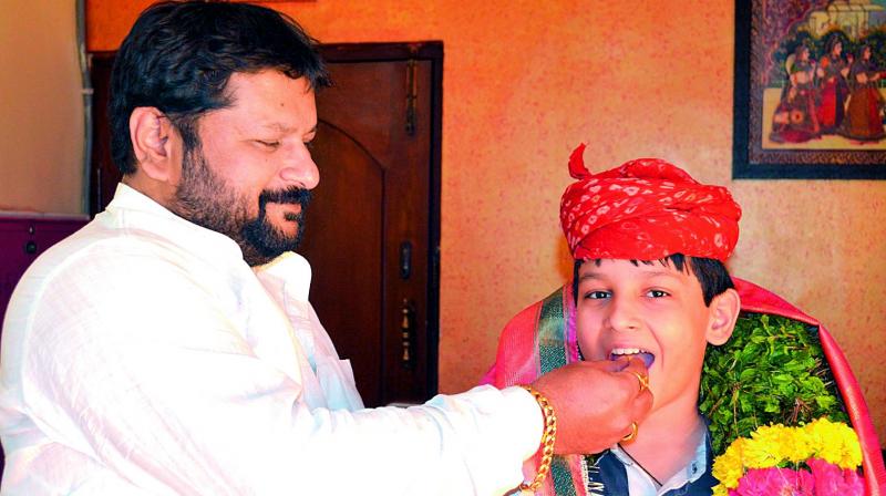 Agastya, 11, and his father Ashwani Kumar.