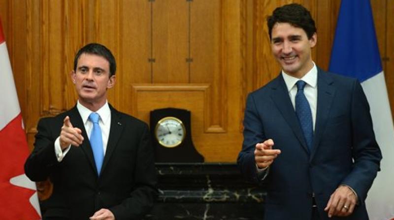 Prime Minister Justin Trudeau, right, and Prime Minister of the France Manuel Valls (Photo: AP)