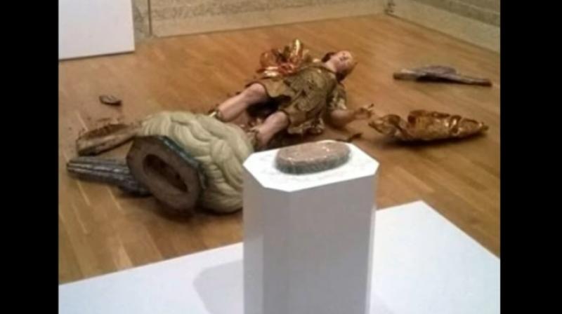 A Brazilian tourist while trying to take a selfie had staggered backwards into the statue of Saint Michael that stood on a pedestal in one of the museums chambers. (Credit: YouTube)