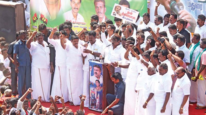 DMDK leader Vijayakanth addresses the gathering demanding the Centre to lift the ban against jallikattu at Alanganallur near Madurai on Monday.(Photo: DC)