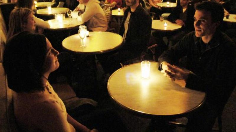 Men paying the entire bill may be considered chauvinistic at times (Photo: AFP)