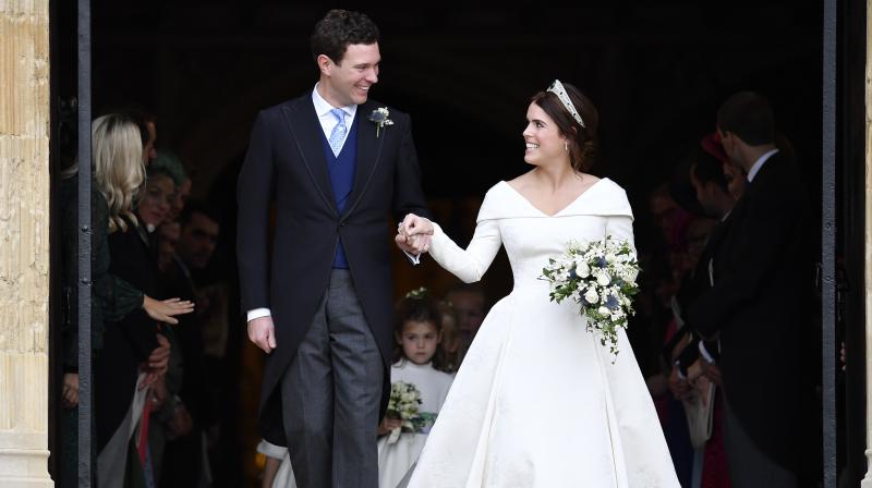 Princess Eugenie, the ninth in line to the British throne, was watched over by the Queen and Prince Philip along with other members of her family as she married her long-term partner. (Photo: AP)