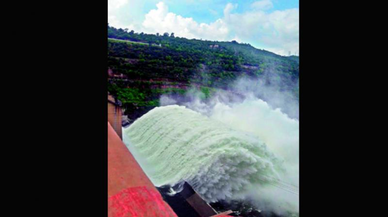 A massive quantity of water rises like a wave at the Srisailam dam on Sunday (Photo: DC)