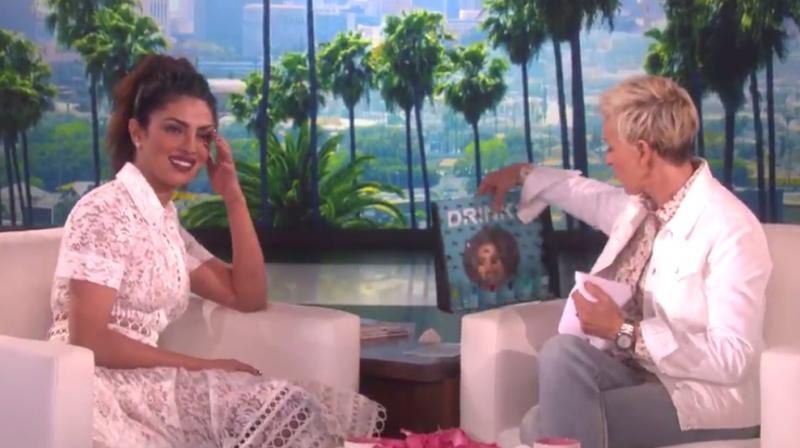 Priyanka is seen here with Ellen DeGeneres who had asked her to down tequilla shot.