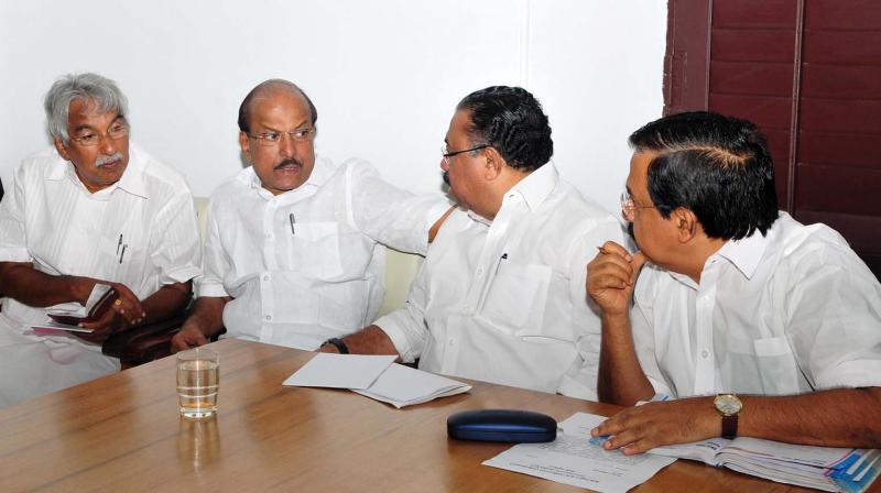 Former chief minister Oommen Chandy, IUML leader P.K. Kunhalikkutty, MP, KPCC president M.M. Hassan and leader of opposition Ramesh Chennithala at the UDF meet. (Photo: A.V. MUZAFAR)