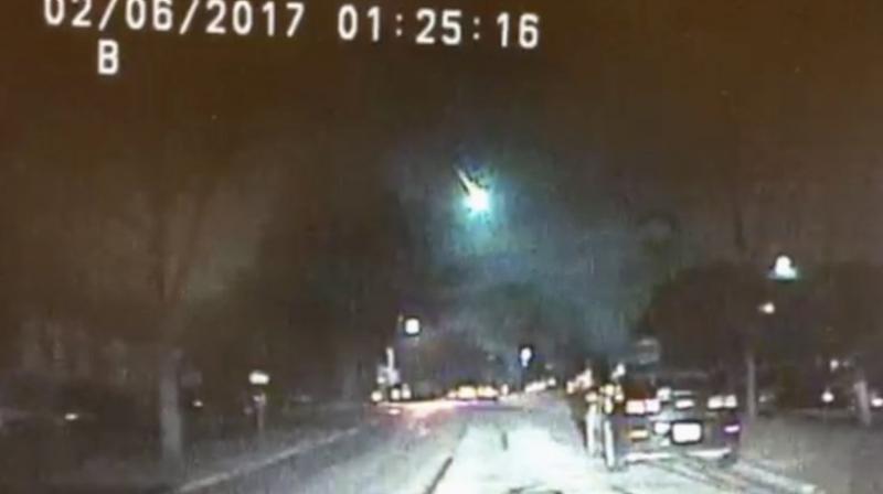 Dashcam video from police cruisers in Wisconsin and Illinois captured the fireball streaking through the dark sky about 1:30 am. (Photo: AP)