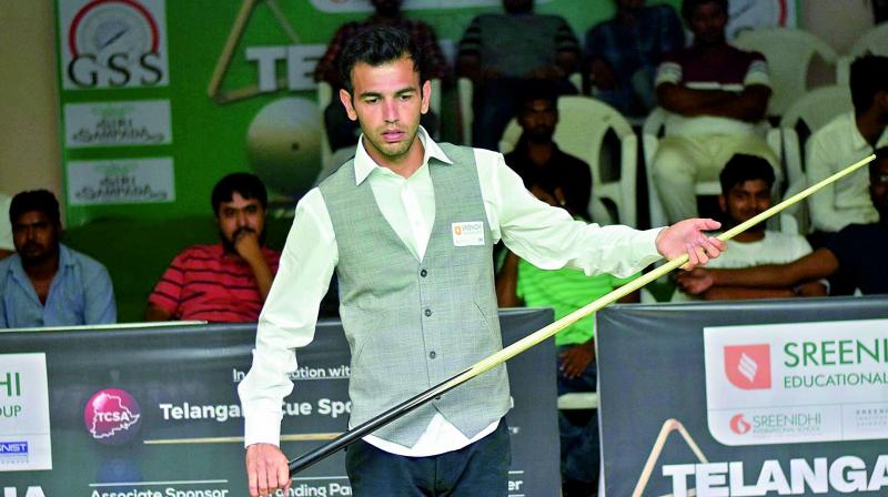 Lucky Vatnani in action during his pre-quarterfinals match against Naresh Kumar in the Telangana Open Snooker Championship being played here in city.