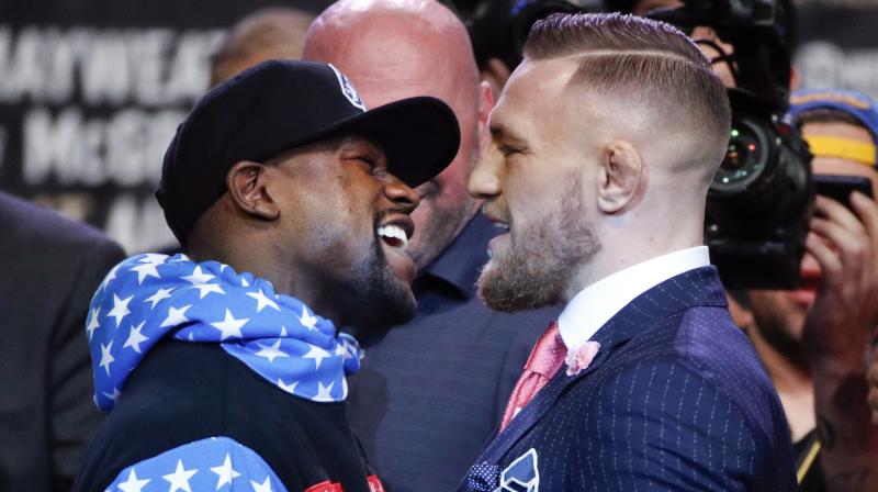 McGregor and Mayweather traded clever insults and profane boasts among each other. (Photo: AP)