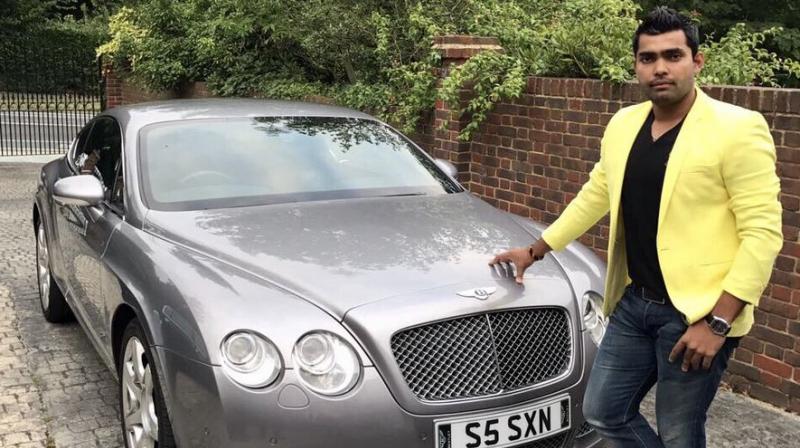 Umar Akmal pictured with his Bentley. (Photo: Twitter)